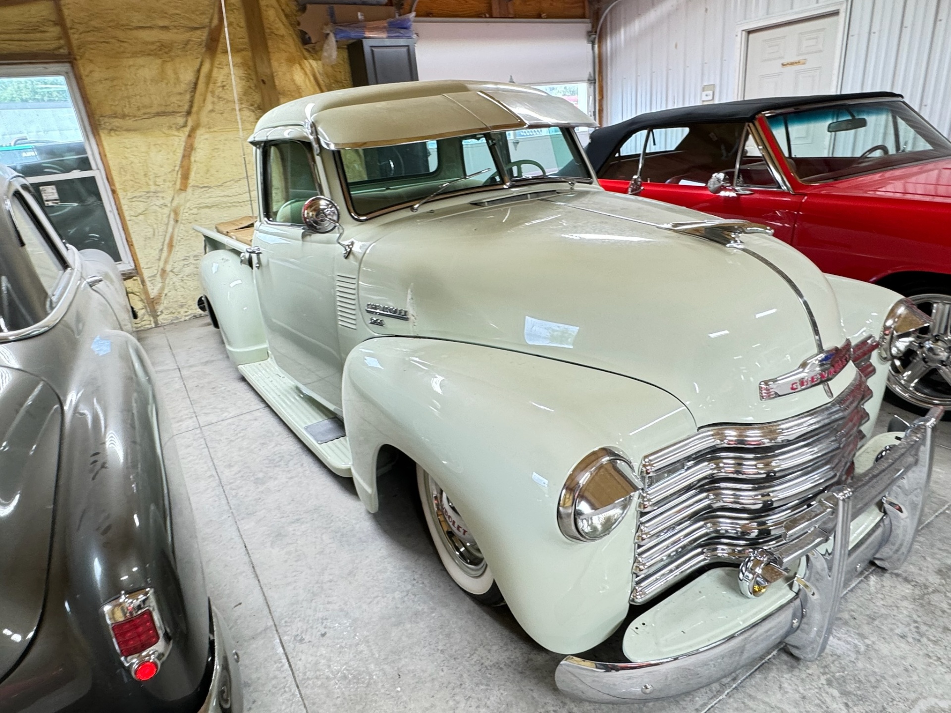 White Chevrolet 3100 in shop